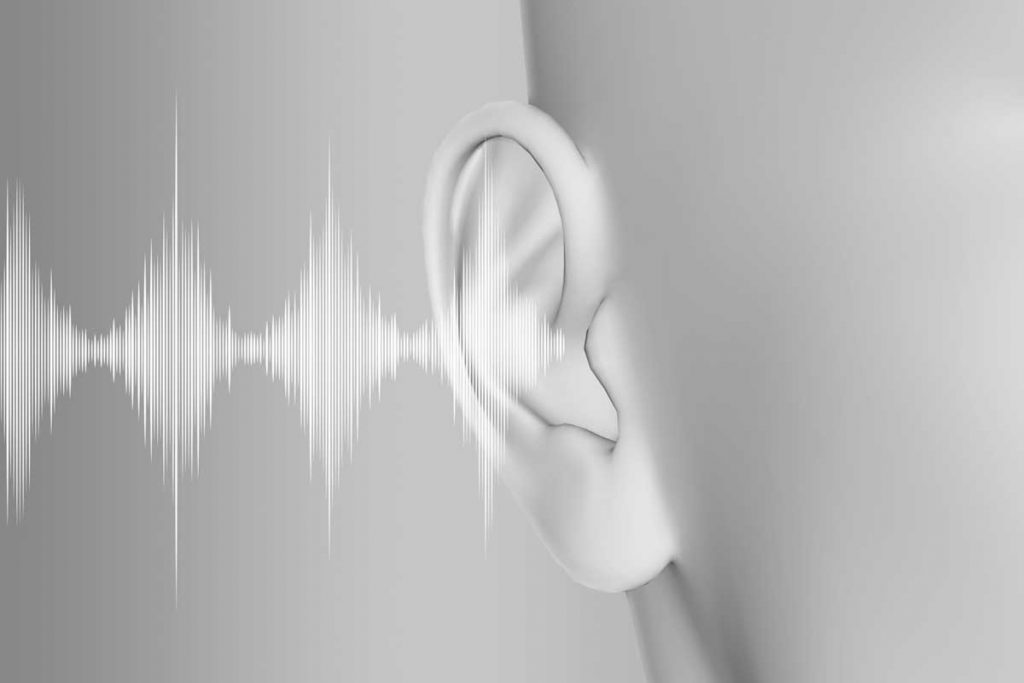 graficzne przedstawienie białego szumu - fale dźwiękowe wpadające do ucha w powiększeniu